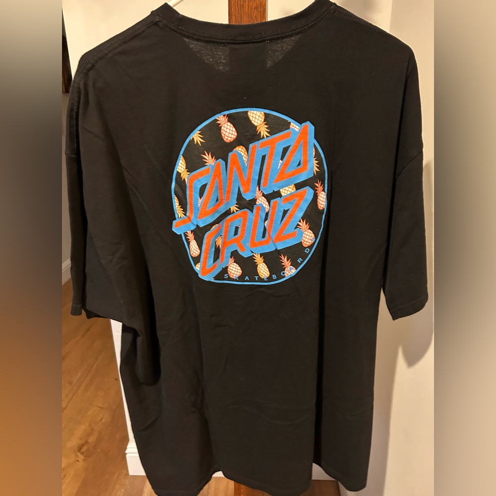 Santa Cruz Skateboards Black Tee with Blue and Orange Pineapple Design